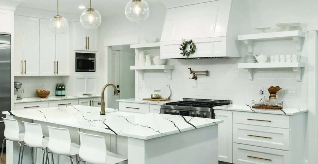 a kitchen with marble counter tops and a stove